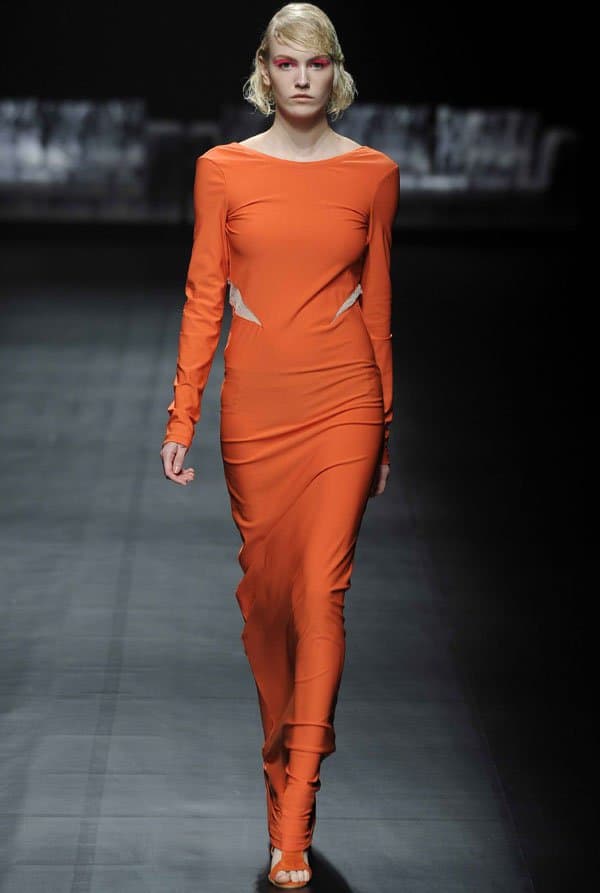 A Degree Fahrenheit model in a monotone orange dress at Tokyo Fashion Week