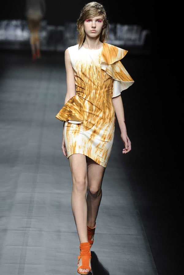Yu Amatsu's orange dress with sophisticated draping showcased at Tokyo Fashion Week