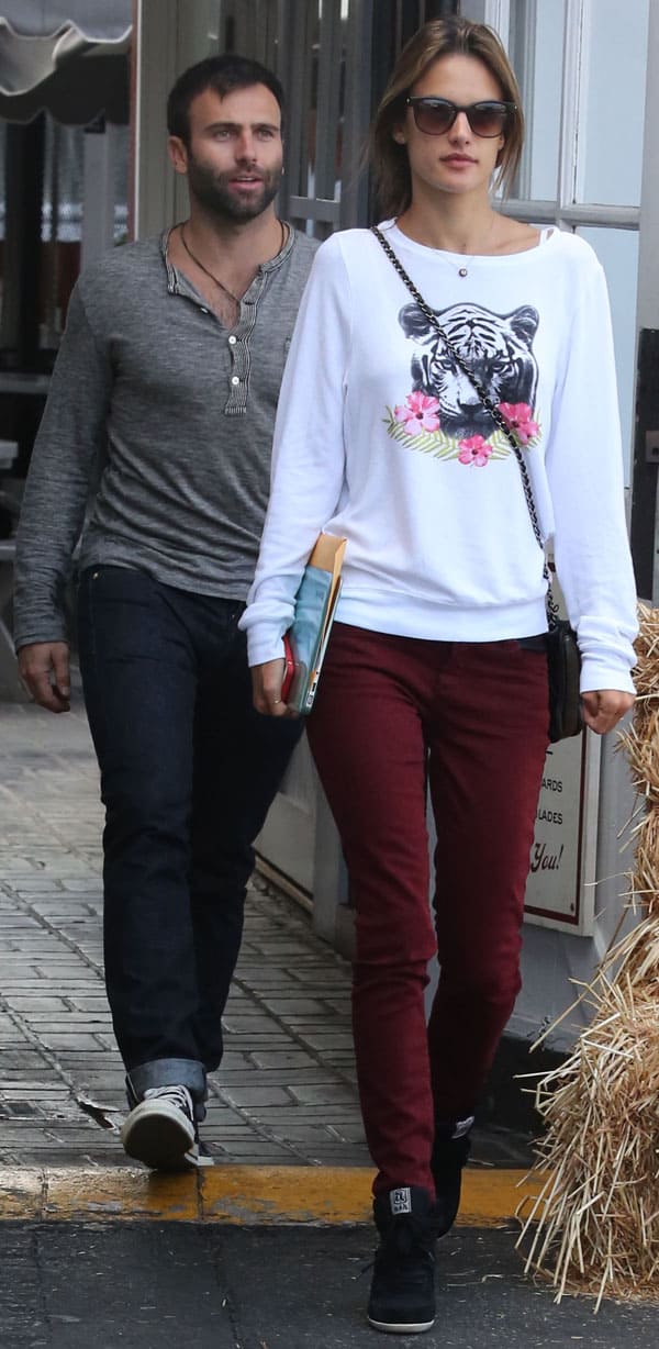 Alessandra Ambrosio with her partner, Jamie Mazur, at the Brentwood Country Mart in Los Angeles on October 8, 2013