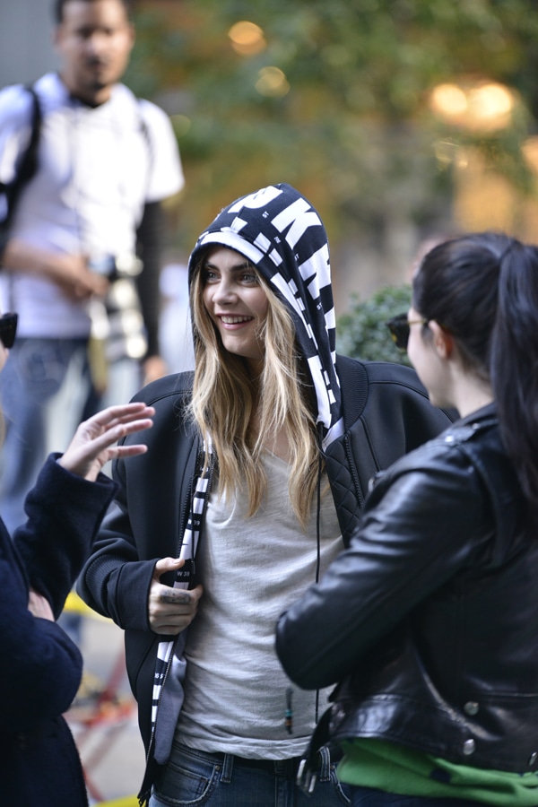 Cara Delevingne at a photoshoot for Donna Karan's mainline fashion label, DKNY, in New York City on October 15, 2013
