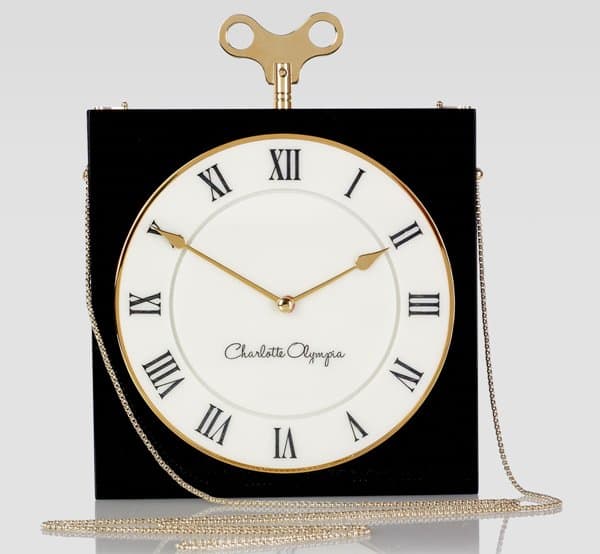 Close-up of the Charlotte Olympia Time Piece Box Clutch, showcasing its detailed design