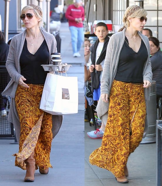 Elsa Pataky picking up pastries and coffee at Joan's on Third in West Hollywood in a yellow, swirl print maxi skirt