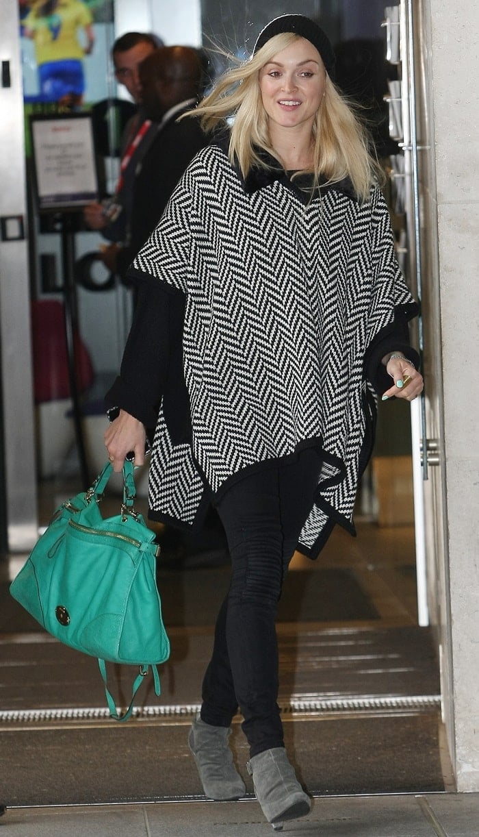 Fearne Cotton wears a beanie and a cute black-and-white patterned poncho