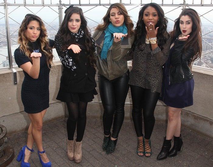 American girl group Fifth Harmony band members Ally Brooke, Camila Cabello, Dinah Hansen, Normani Hamilton, and Lauren Jauregui pose at the Empire State Building