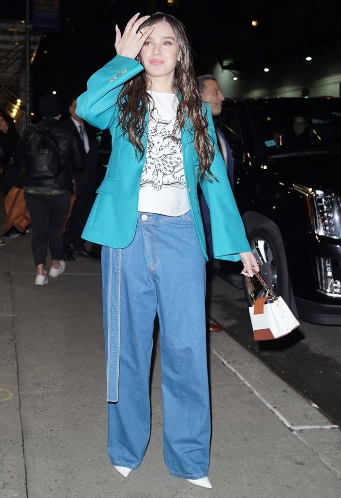 Hailee Steinfeld wearing Lanvin oversized asymmetric wide-leg jeans