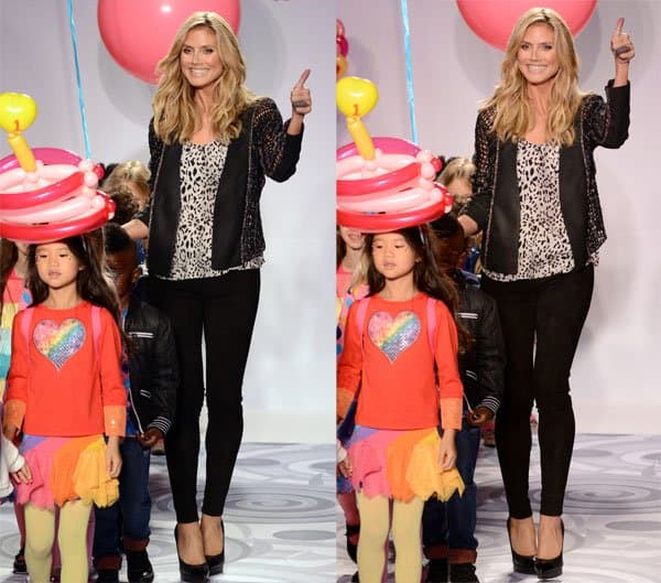 Heidi Klum presenting her holiday line Truly Scrumptious for Babies R Us at the Kids Fashion Week in New York on October 5, 2013