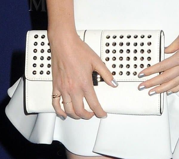 Kate Mara's white studded clutch brought a structured feel to an otherwise feminine ensemble