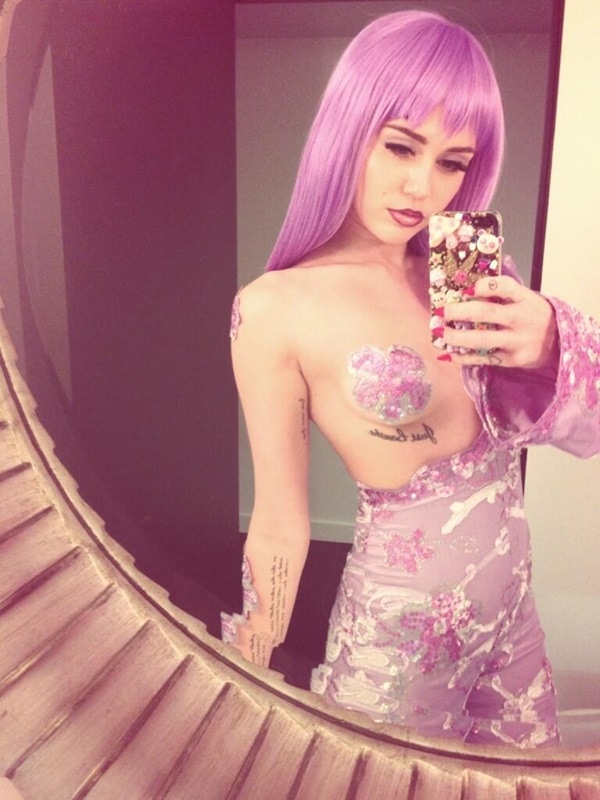 Miley Cyrus wears an embellished nipple pastie