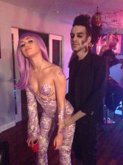 Miley Cyrus dressed as Lil' Kim for Halloween