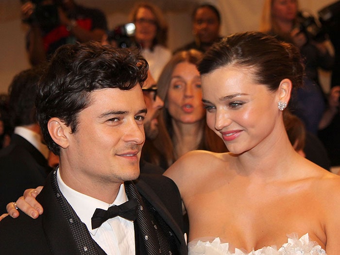 Orlando Bloom and Miranda Kerr smile together