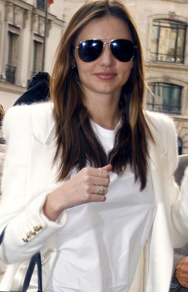 Miranda Kerr was in good spirits as she walked along the streets of Paris