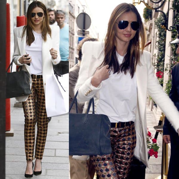 Miranda Kerr spotted in Paris on October 2, 2013, wearing a Balmain wool cardigan, Balmain metallic jacquard trousers, Oliver Peoples Pryce Aviator sunglasses, Balmain Pierre bag, and Balmain black suede pumps