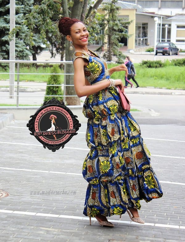 Onyinye in a unique, colorful printed tier dress
