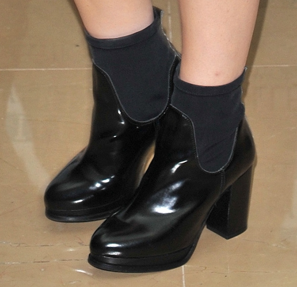 Perrie Edwards wears a pair of neoprene-detailed Topshop boots