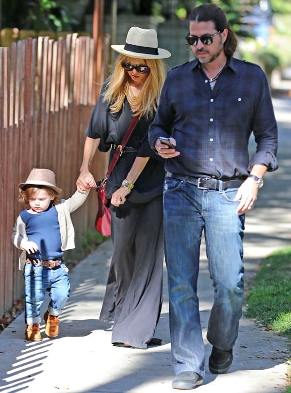 Stylist Rachel Zoe with husband Roger Berman and son Skyler Berman take a walk
