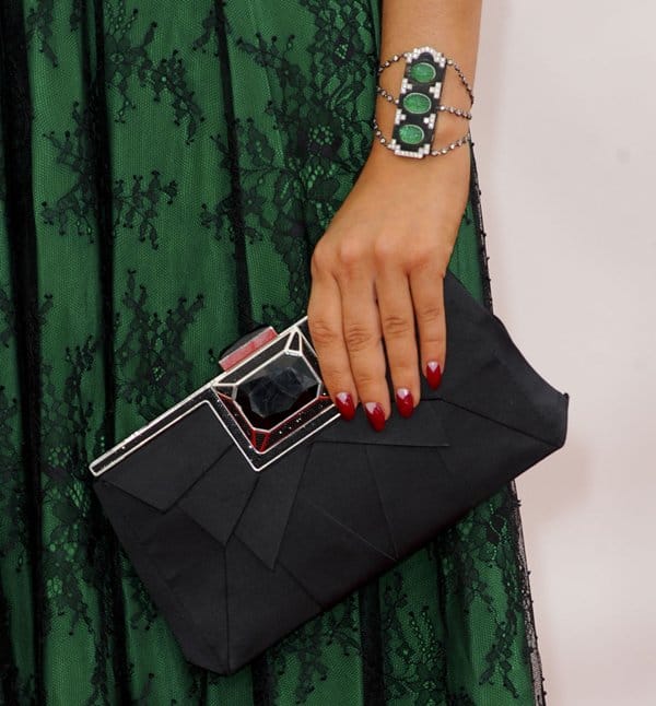 Sarah Hyland's Swarovski clutch and art deco emerald-and-diamond cuff