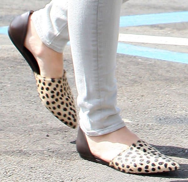 Sophia Bush wearing cheetah print shoes for a pop of color and texture