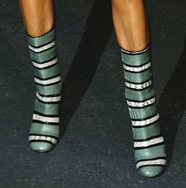 Anna Dello Russo wearing Givenchy tricolor snakeskin boots at the Givenchy Spring/Summer 2014 show during Paris Fashion Week