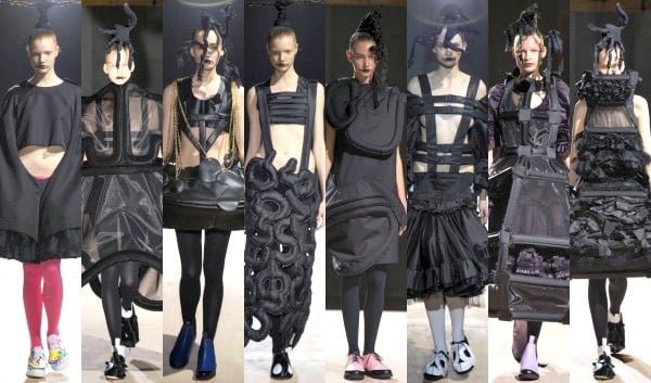 Models display Rei Kawakubo's Spring/Summer 2014 collection, featuring bold sculptural designs, layered textures, and avant-garde silhouettes in an all-black palette