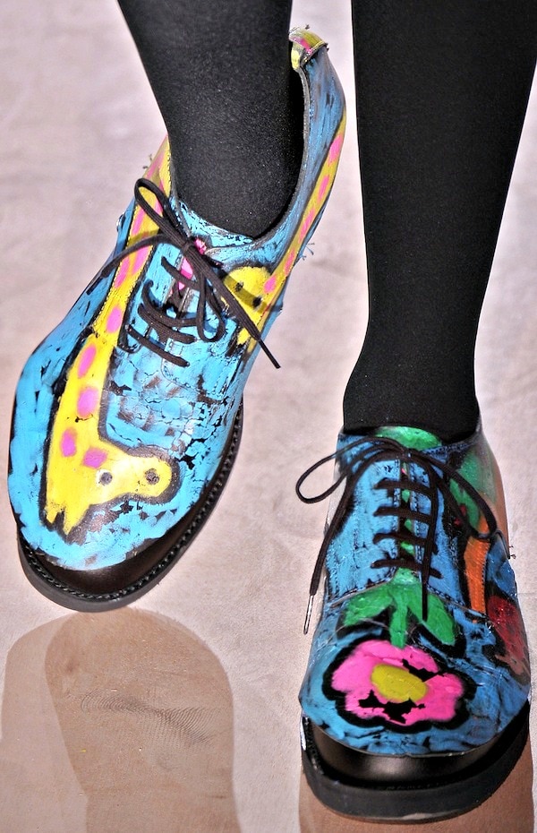 Vivid blue oxford shoes adorned with colorful hand-painted floral and animal designs