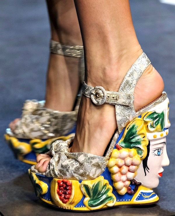 Dolce & Gabbana wedge sandals with an intricate, colorful sculpted platform featuring a face and fruit motifs