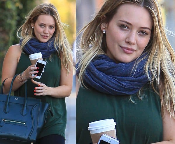 Hilary Duff perfectly matches her infinity scarf with a pine green Celine Boston bag