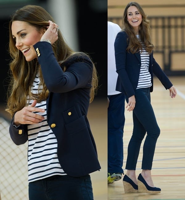 Kate Middleton playing volleyball at a SportsAid athlete workshop at the Copper Box in the Queen Elizabeth Olympic Park in London on October 18, 2013