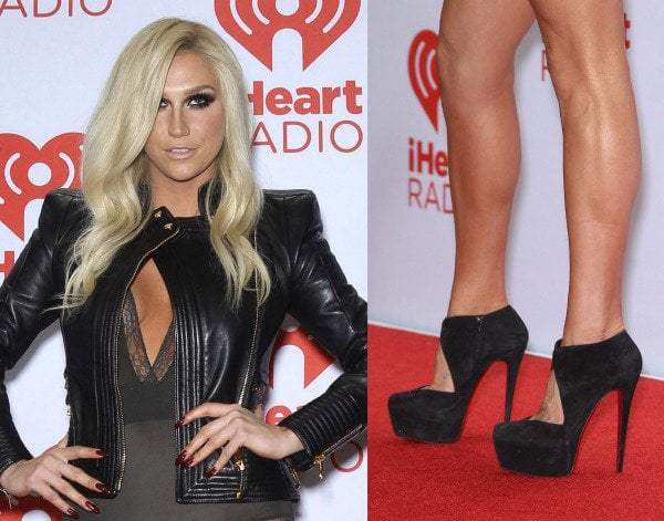 Kesha completes her edgy ensemble with a towering pair of black platform pumps