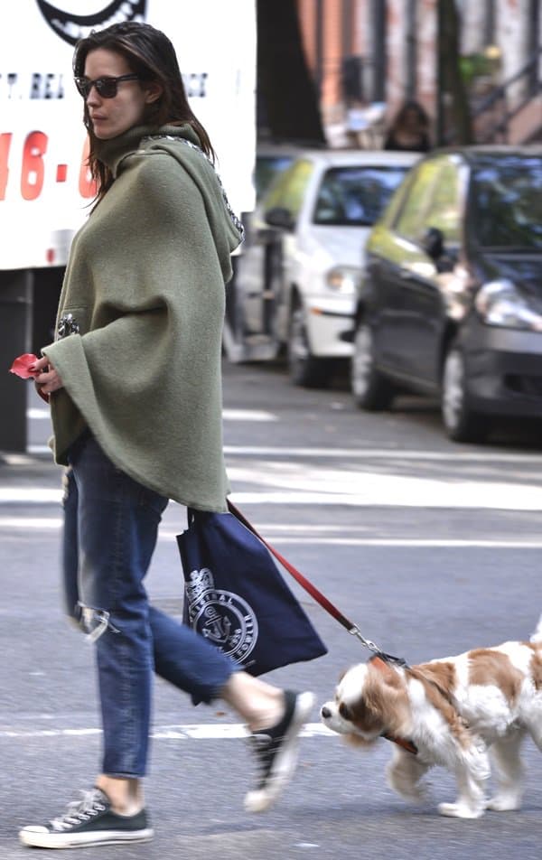 Liv Tyler effortlessly walks her dog early in the morning in Manhattan on October 17, 2013, showcasing a natural look without makeup