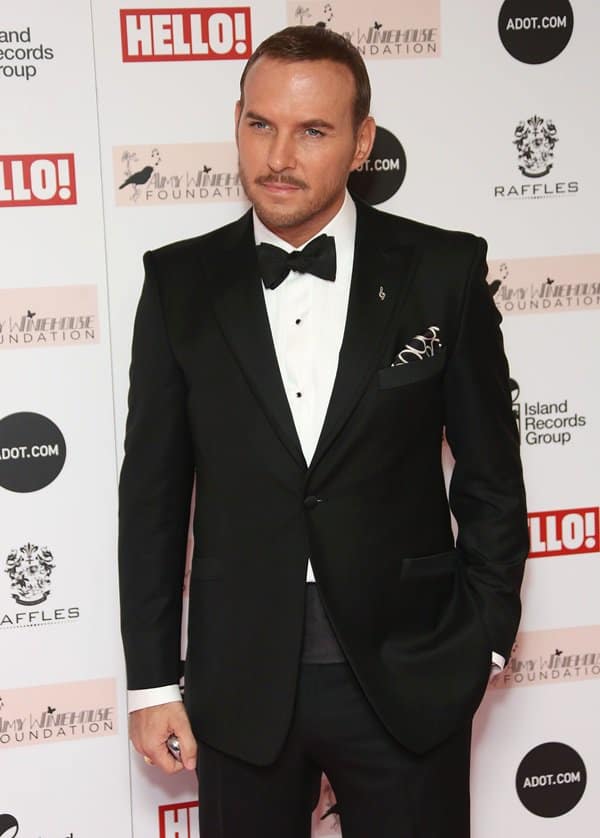 Matt Goss attending the Amy Winehouse Foundation Ball at the Dorchester Hotel on November 20, 2013, looking dapper in his signature style