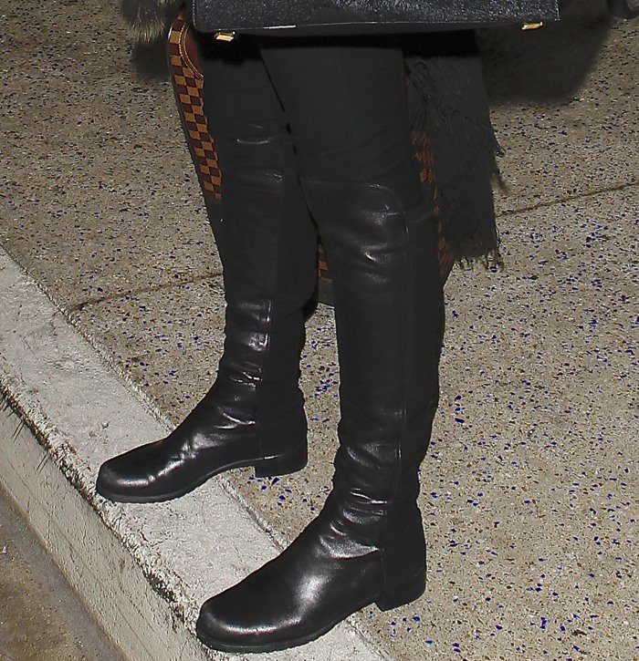 Alessandra Ambrosio's sleek leather Stuart Weitzman 5050 over-the-knee boots are one of fall's top must-haves