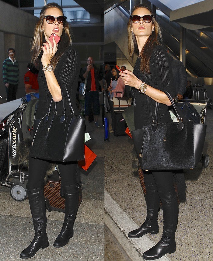 Alessandra Ambrosio wears an all-black ensemble as she arrives back in the United States from Paris