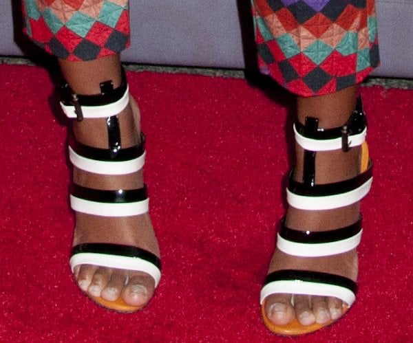 Solange Knowles completes her patterned outfit with a pair of Bottega Veneta sandals on her feet