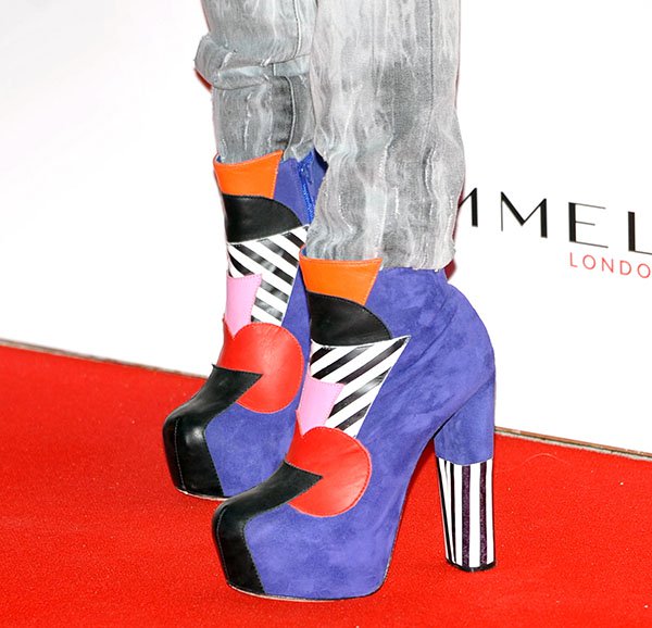 Cher Lloyd turns heads with these eye-popping, colorful platform heels featuring bold geometric designs and a striking mix of patterns