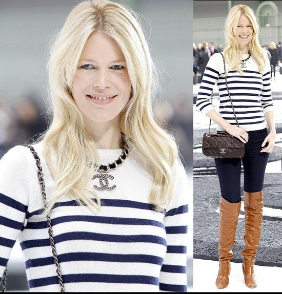 Claudia Schiffer in slouchy over the knee cognac boots attends the Chanel Ready to Wear Spring/Summer 2011 show during Paris Fashion Week at Grand Palais on October 5, 2010, in Paris, France