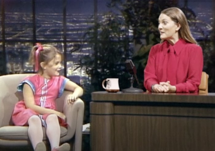 Drew Barrymore interviews her 7-year-old self in an adorable promo for her daytime talk show