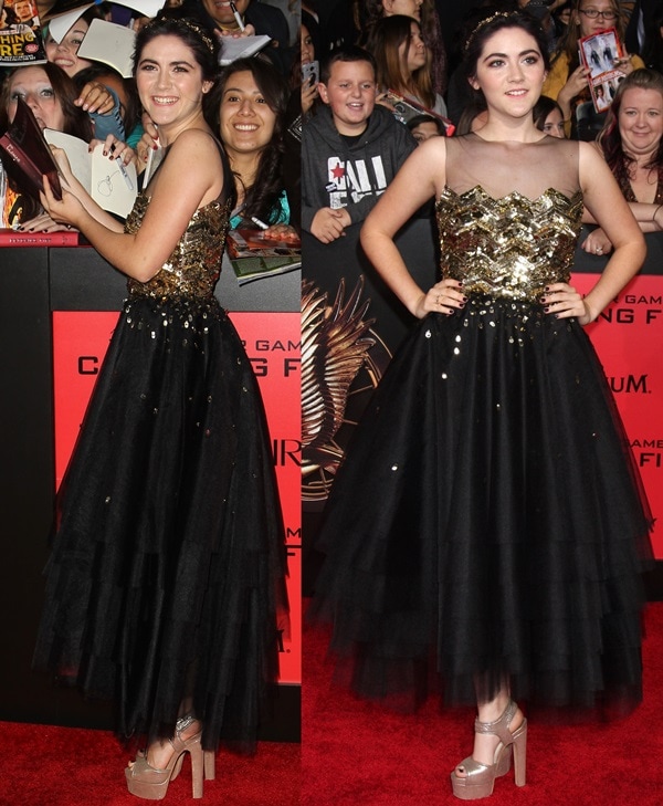 Isabelle Fuhrman attends the premiere of "The Hunger Games: Catching Fire" at Nokia Theatre L.A. Live in Los Angeles on November 19, 2013