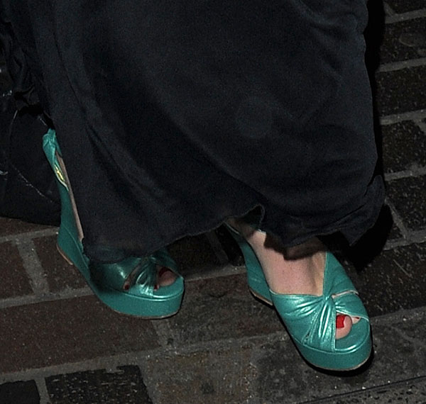 Jaime Winstone's green wedge sandals featuring a crisscross front design