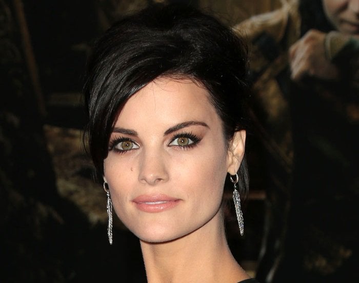 Jaimie Alexander's silver feather-shaped earrings