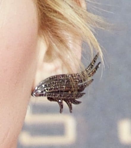 Close-up of Jennifer Lawrence's Ana Khouri winged earring at the Madrid premiere