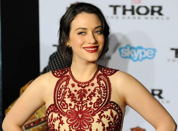 Kat Dennings' hair was styled in a loose chignon with soft tendrils that framed her gorgeous face
