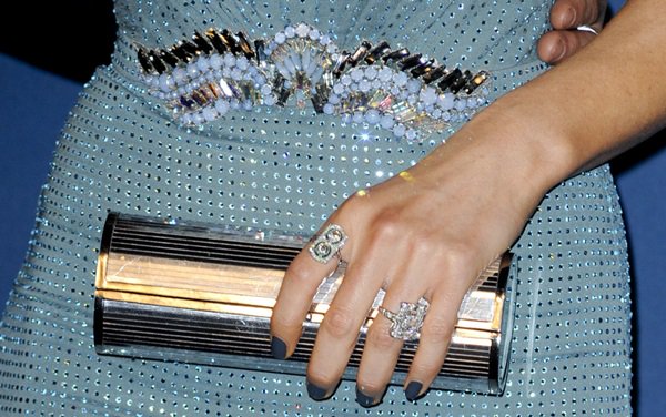 Kate Beckinsale carried a silver Jimmy Choo 'Cosma' clutch