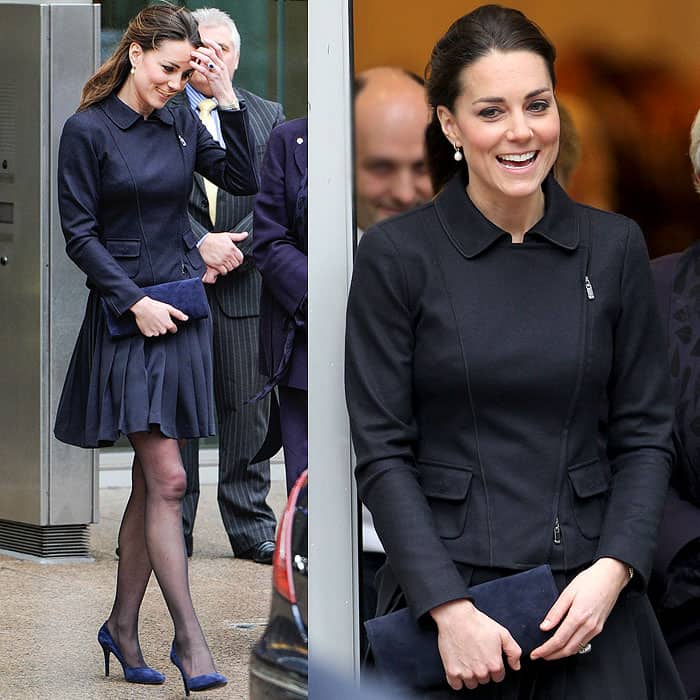 On November 20, 2013, at the Place2Be Forum, Kate Middleton wore an Orla Kiely solid crepe blend skirt, paired with a Stuart Weitzman for Russell & Bromley navy suede muse clutch, Annoushka pearl drop earrings on Kiki McDonough diamond hoop earrings, and the Royal Collection Garrard 12k Ceylon sapphire and diamond engagement ring