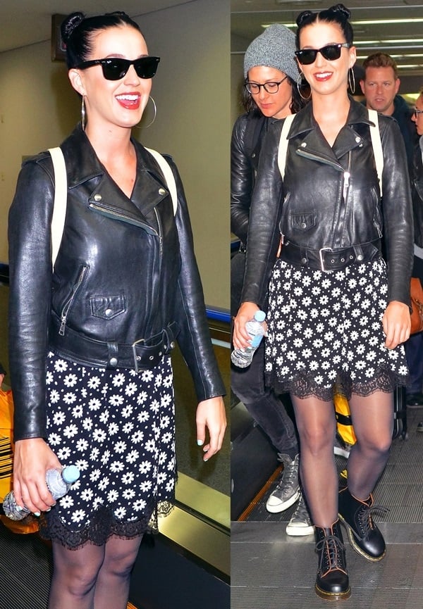 Katy Perry wears Ray-Ban Original Wayfarer 2140 sunglasses and a black signature Acne moto jacket
