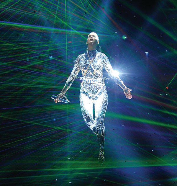 Katy Perry was suspended in the air above the stage, surrounded by dancers and a dazzling light show