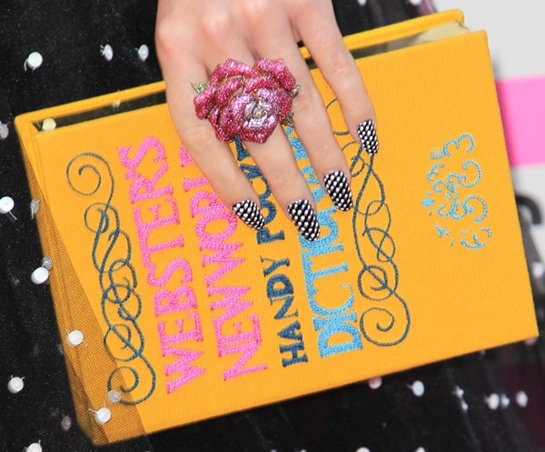 Katy Perry accessorizes with an Olympia Le-Tan ‘Webster’s New World Dictionary’ box clutch at the 2013 AMAs
