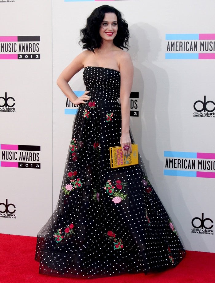 Katy Perry stuns in a dotted Oscar de la Renta Spring 2014 sheer tulle gown, speckled with colorful embroidered flowers at the 2013 AMAs