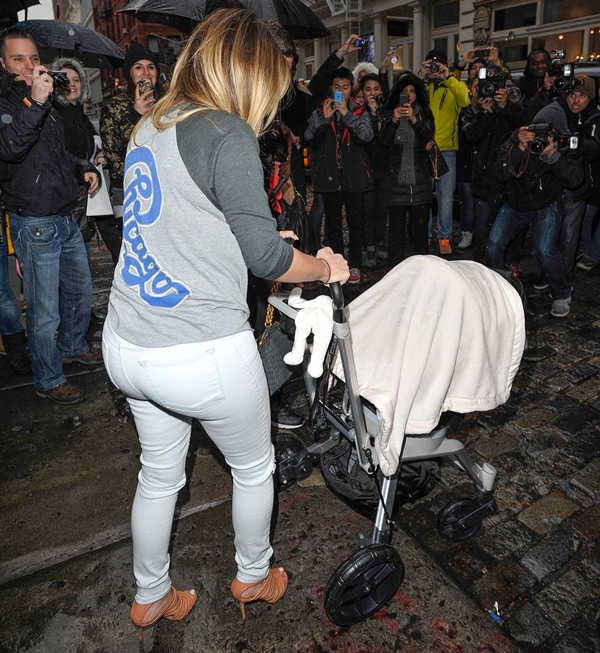 Kim Kardashian pushing baby North in an Orbit Baby stroller