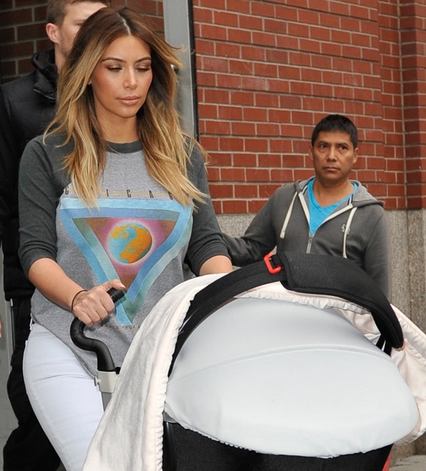Kim Kardashian pushes baby North West in an Orbit Baby stroller in Manhattan