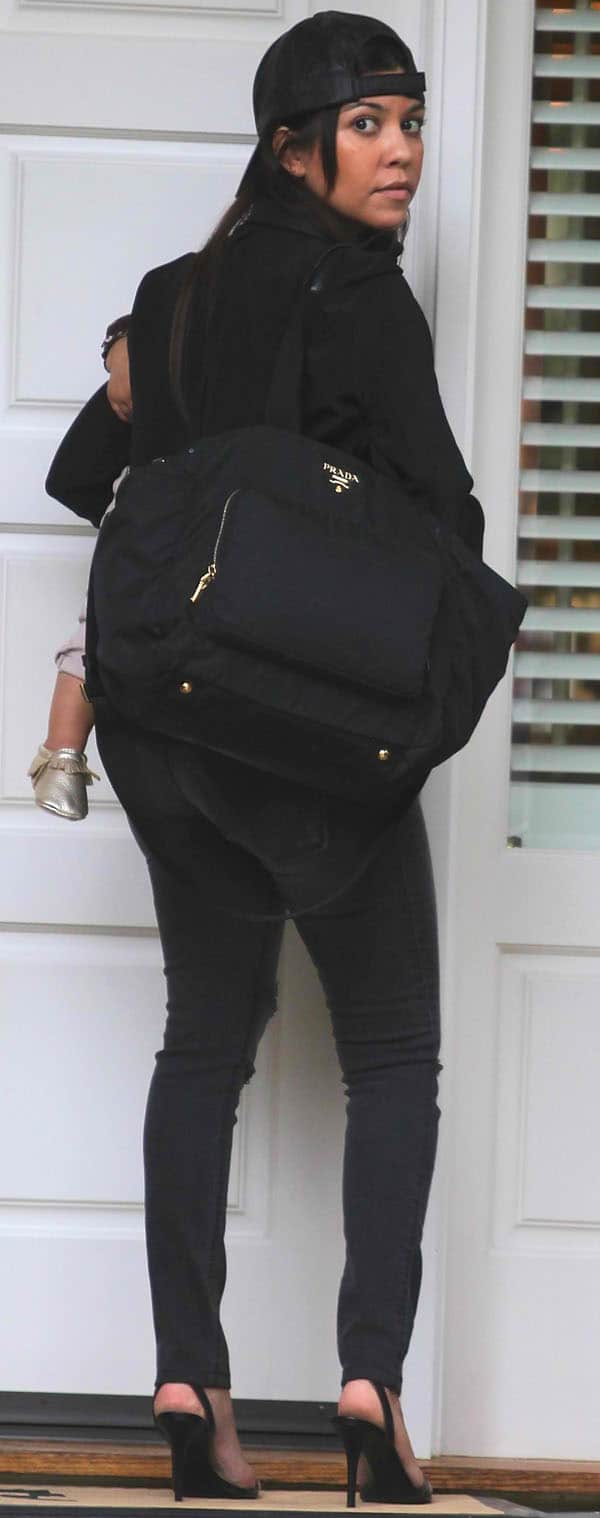 Kourtney Kardashian shows off her Prada baby bag